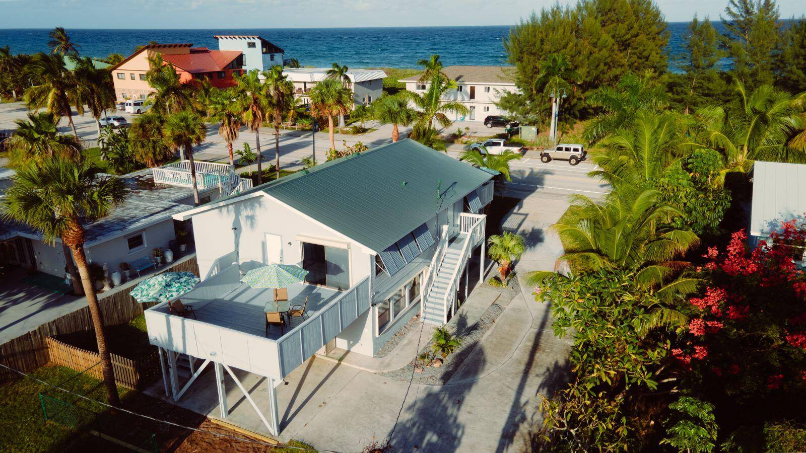 ENDLESS POSSIBILITIES ! This home located directly on South Ocean Drive and across from the beach can be a great home for the large family or live in one and ...