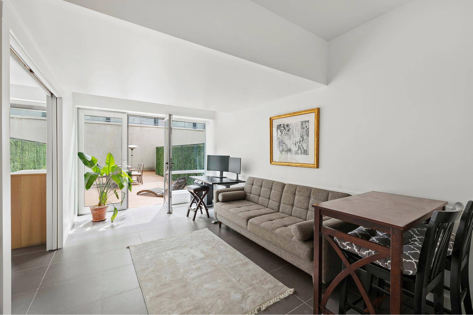 Terrace Time ! Rarely offered Garden Duplex convertible to 3 bedrooms.