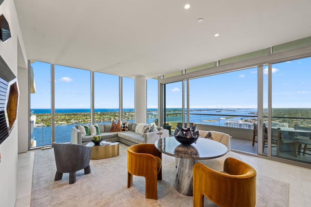 This 23rd floor residence at La Clara offers sweeping ocean and Intracoastal views and beautifully curated interiors designed by Marc Michaels Interior Design.