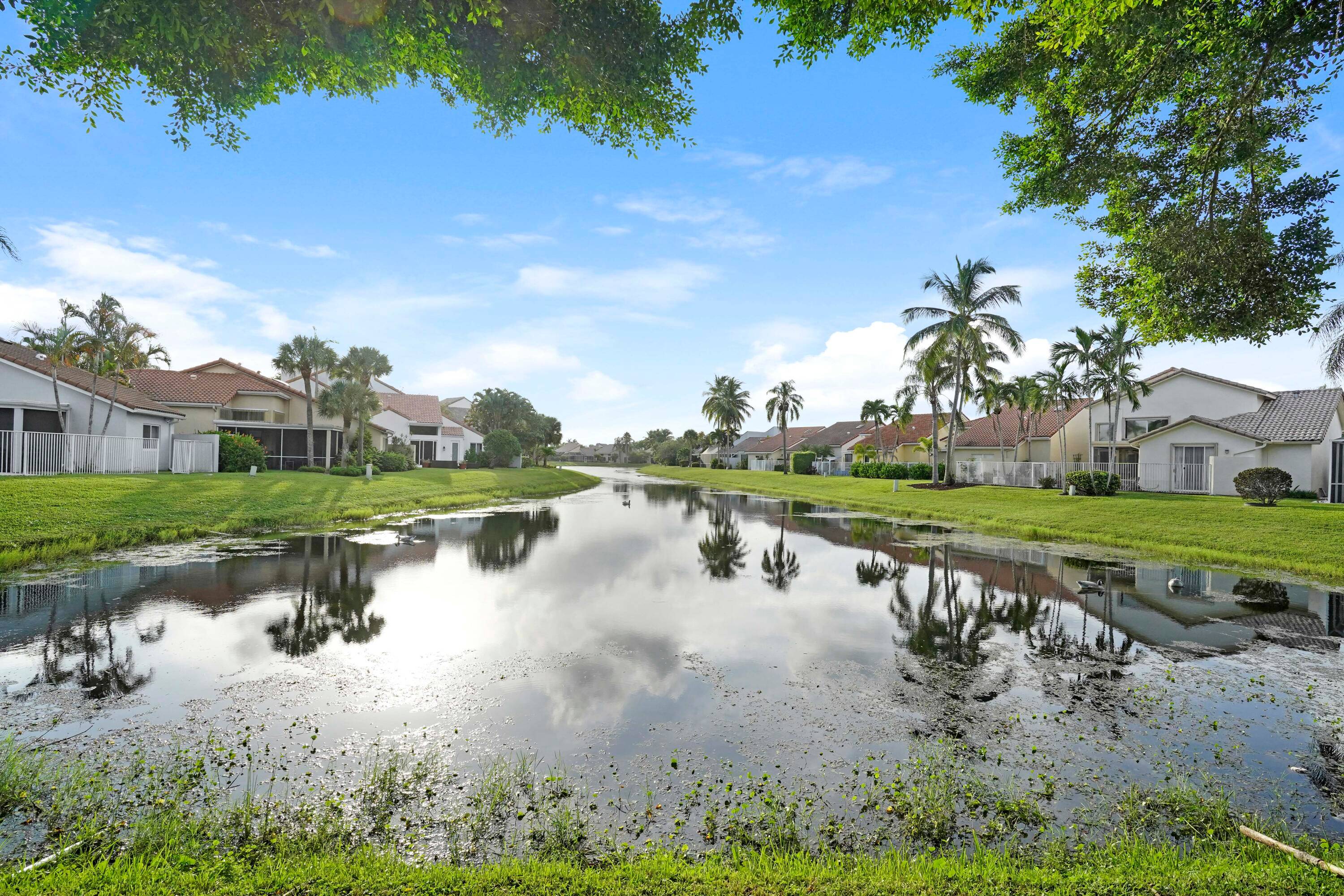NO MEMBERSHIP FEES to live in this Exceptionally Beautiful updated 3 bed 2 bath home with a den in the sought after Newport Bay Club.