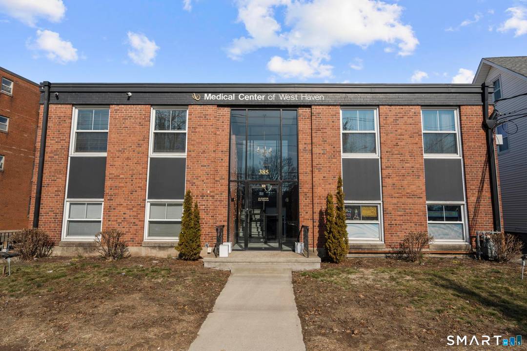 10, 272 SF two story brick medical professional office building located in the Central Business District of West Haven directly across from the historic West Haven Green.