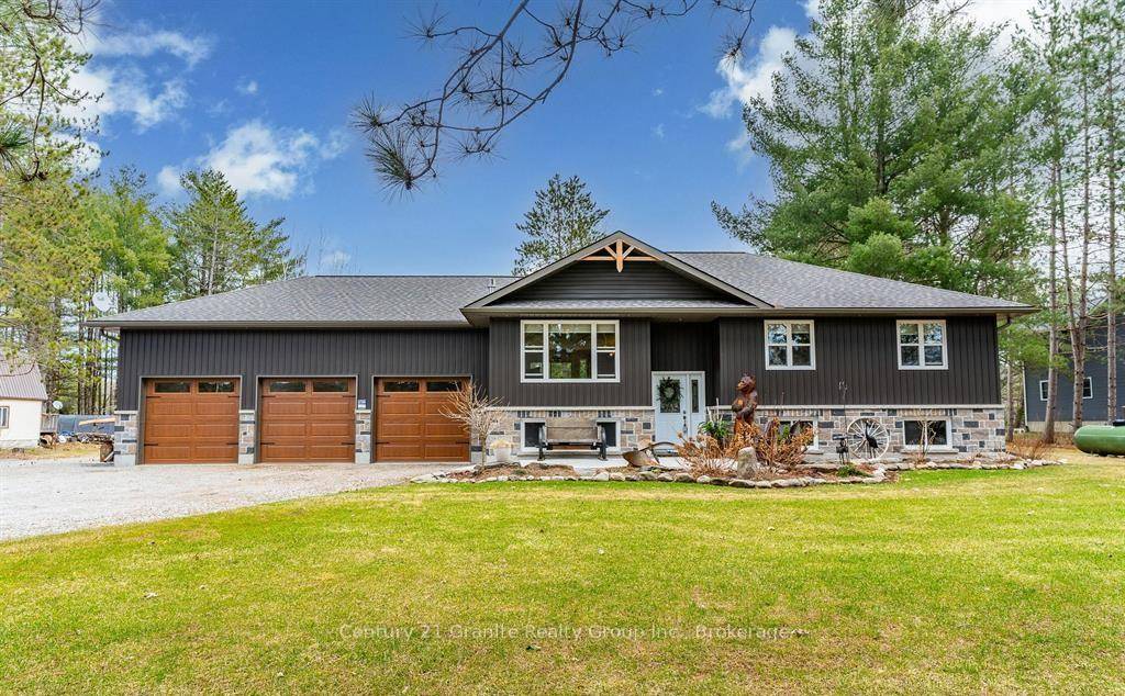 Meticulously maintained and beautifully appointed, this 2021 raised bungalow is nestled on a picture perfect 1.