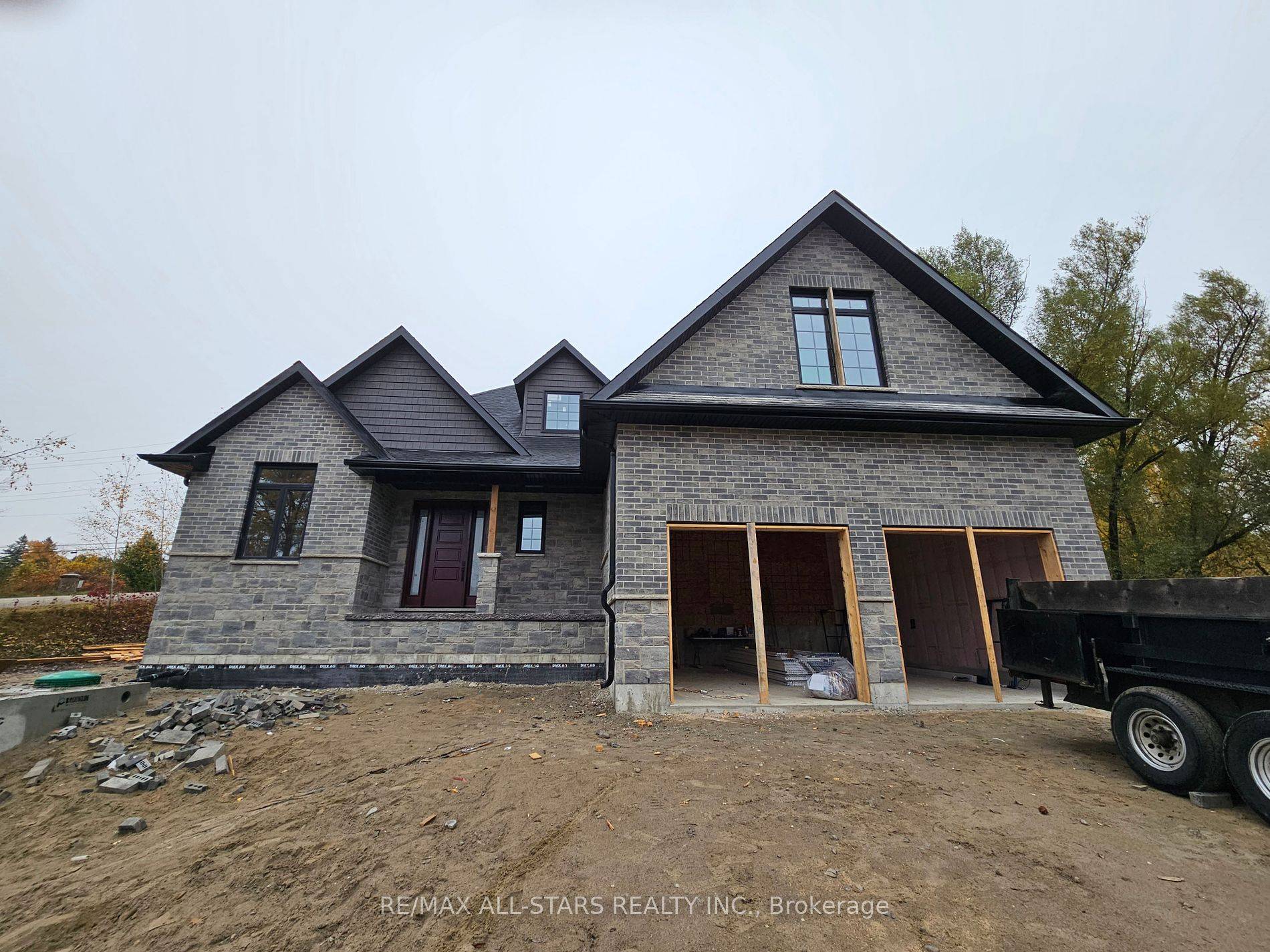 BRAND NEW ! ! CUSTOM DESIGNED HOME near Cameron Lake and close proximity to Fenelon Falls.