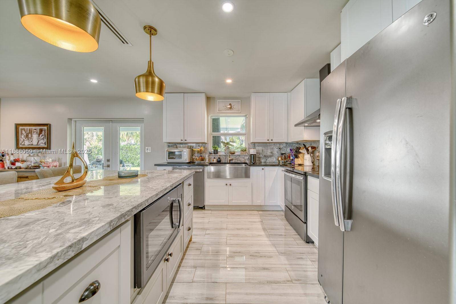 Modern 3 bedroom, 2 bath corner home in Palmetto Bay !