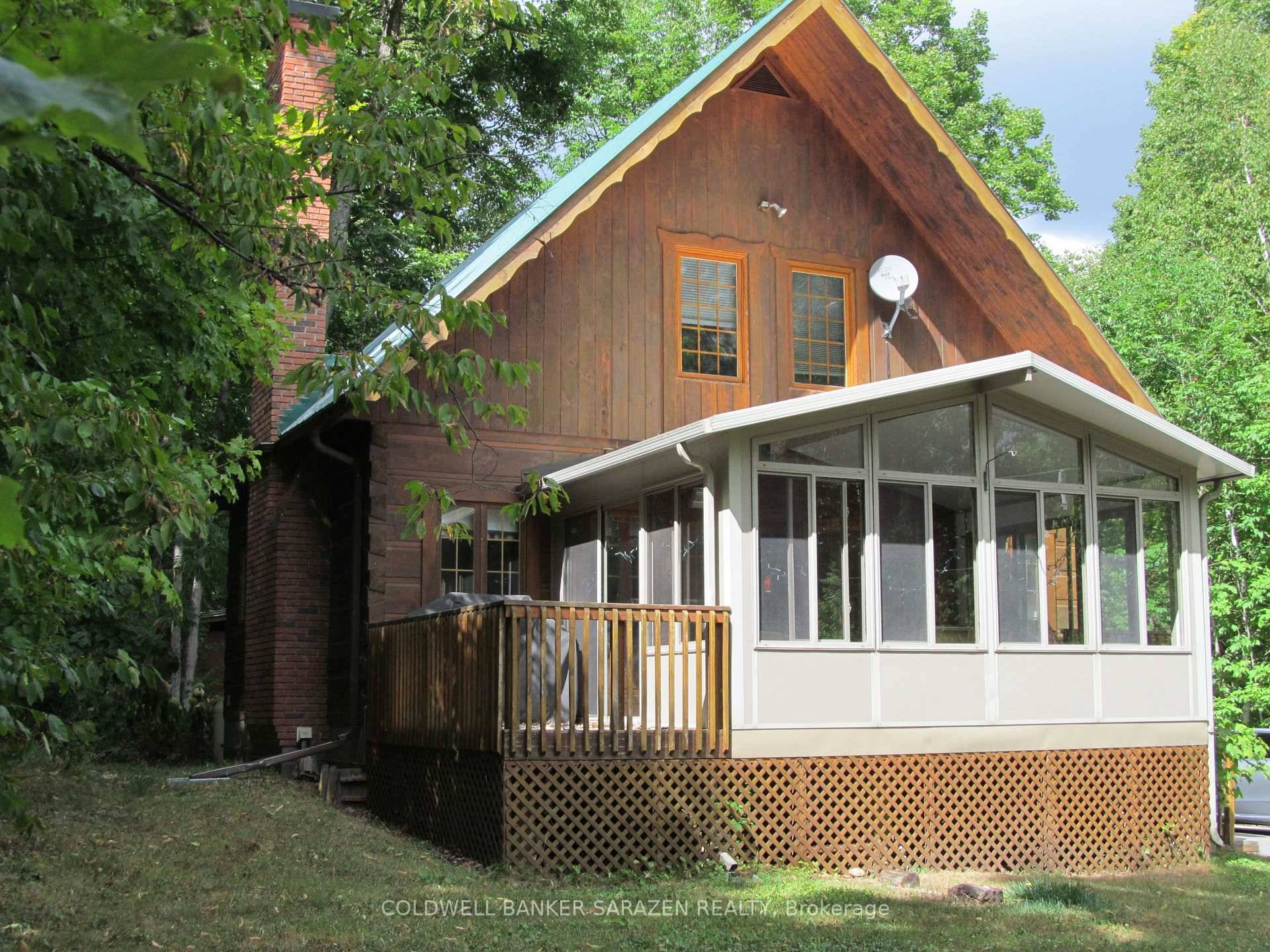 True Alpine chalet style log home located in the Peaks Village Calabogie with deeded access to pristine Calabogie Lake five minutes to the ski hill, golf course and lake this ...