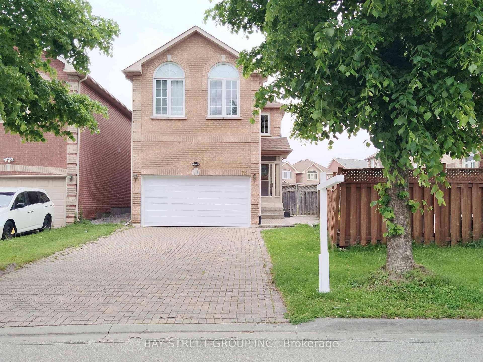 Spacious end unit property offering enhanced privacy and side yard access.