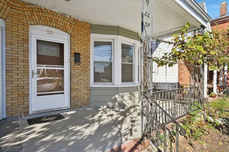 Solid all brick half duplex with strong upside potential in Raritan's downtown district.