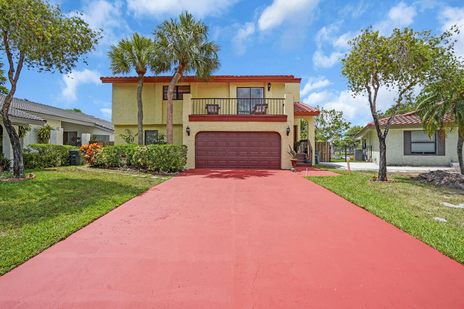 Welcome to the completely renovated 2 story lakefront pool home located in the highly desirable Vista Verde community in the heart of Boca Raton.