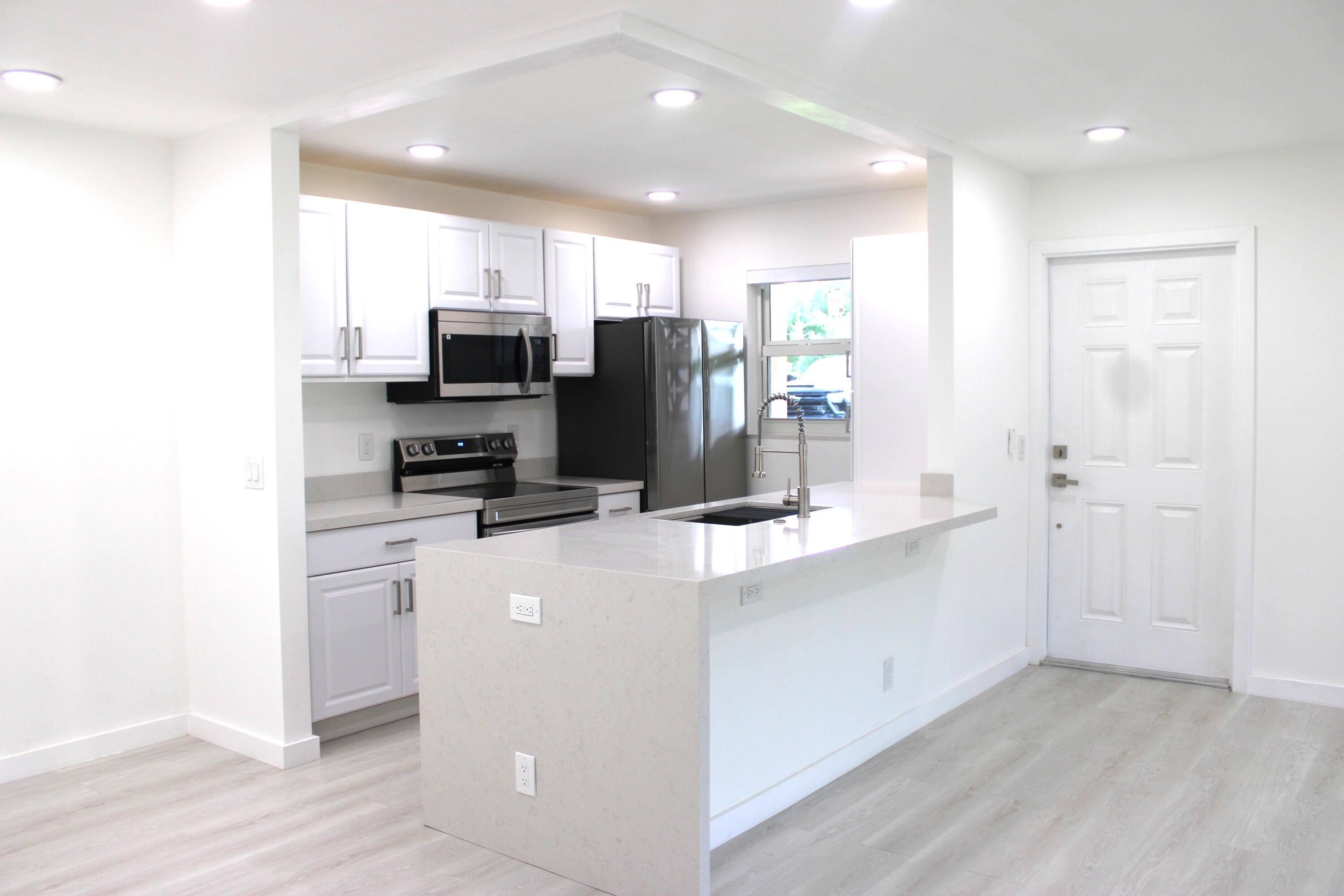 Open and bright, this fully updated 2 bedroom, 2 bath villa condo offers modern living at its finest.