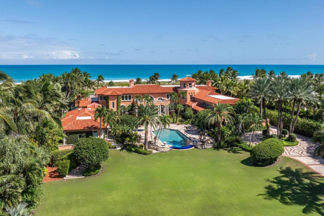 Extraordinary, generational estate set on extremely rare 4 acres with 230' of direct ocean frontage.