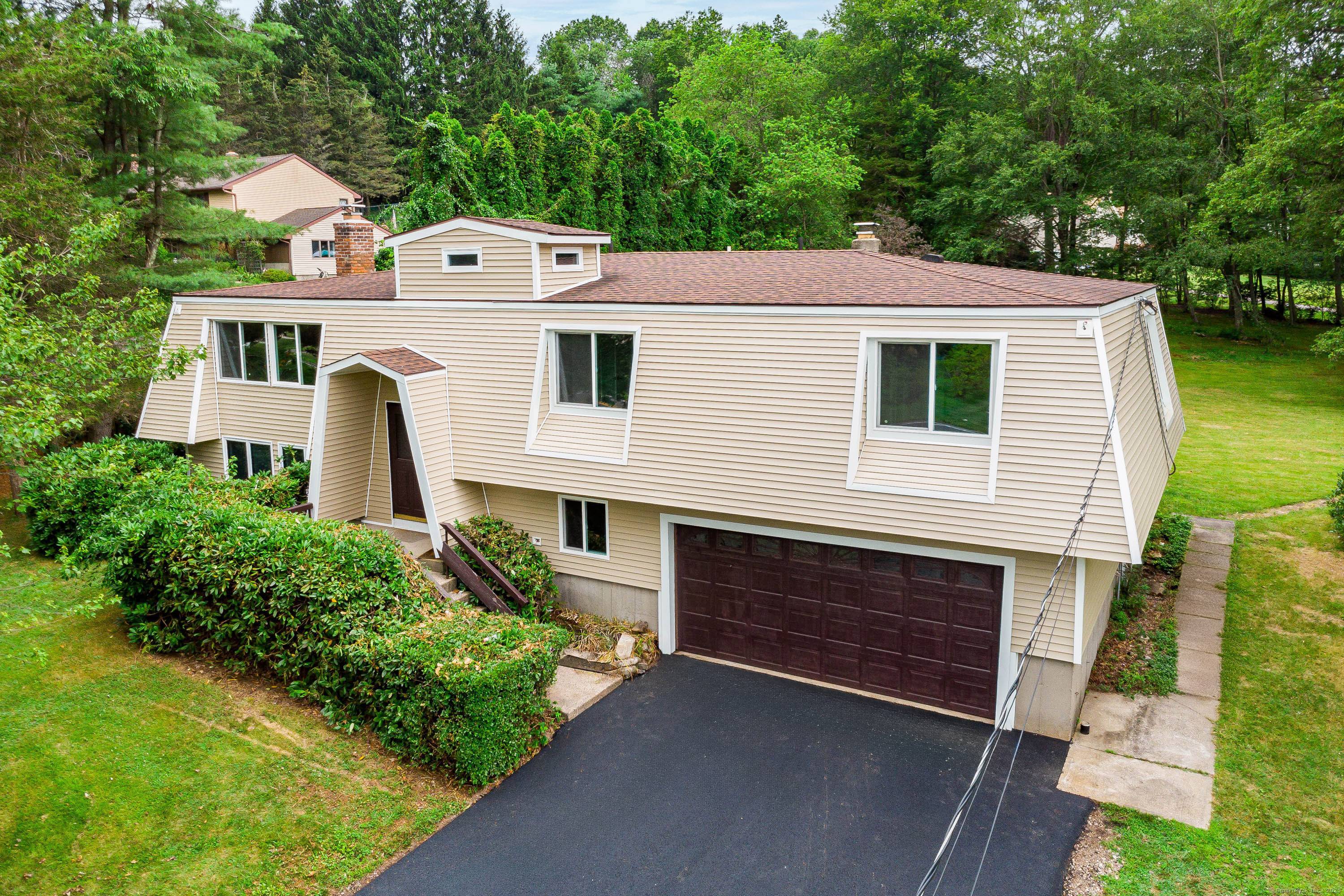 Welcome to this beautifully remodeled raised ranch situated on a private lot in Prospect.