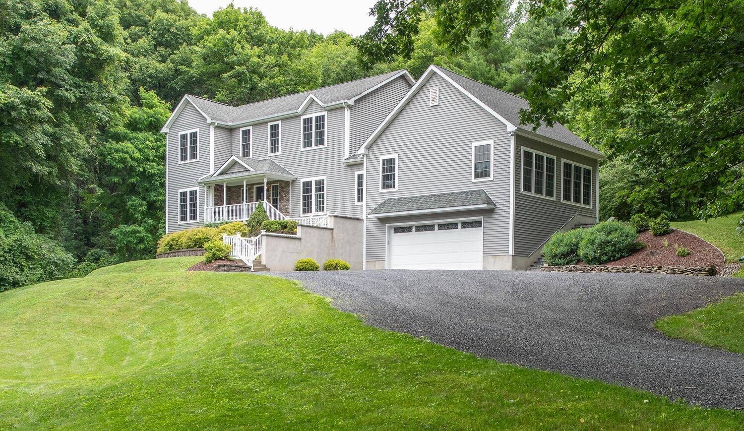 Welcome to this elegant four bedroom, two and a half bath Colonial gracefully set on three beautifully manicured acres in one of Red Hook s most desirable executive neighborhoods.