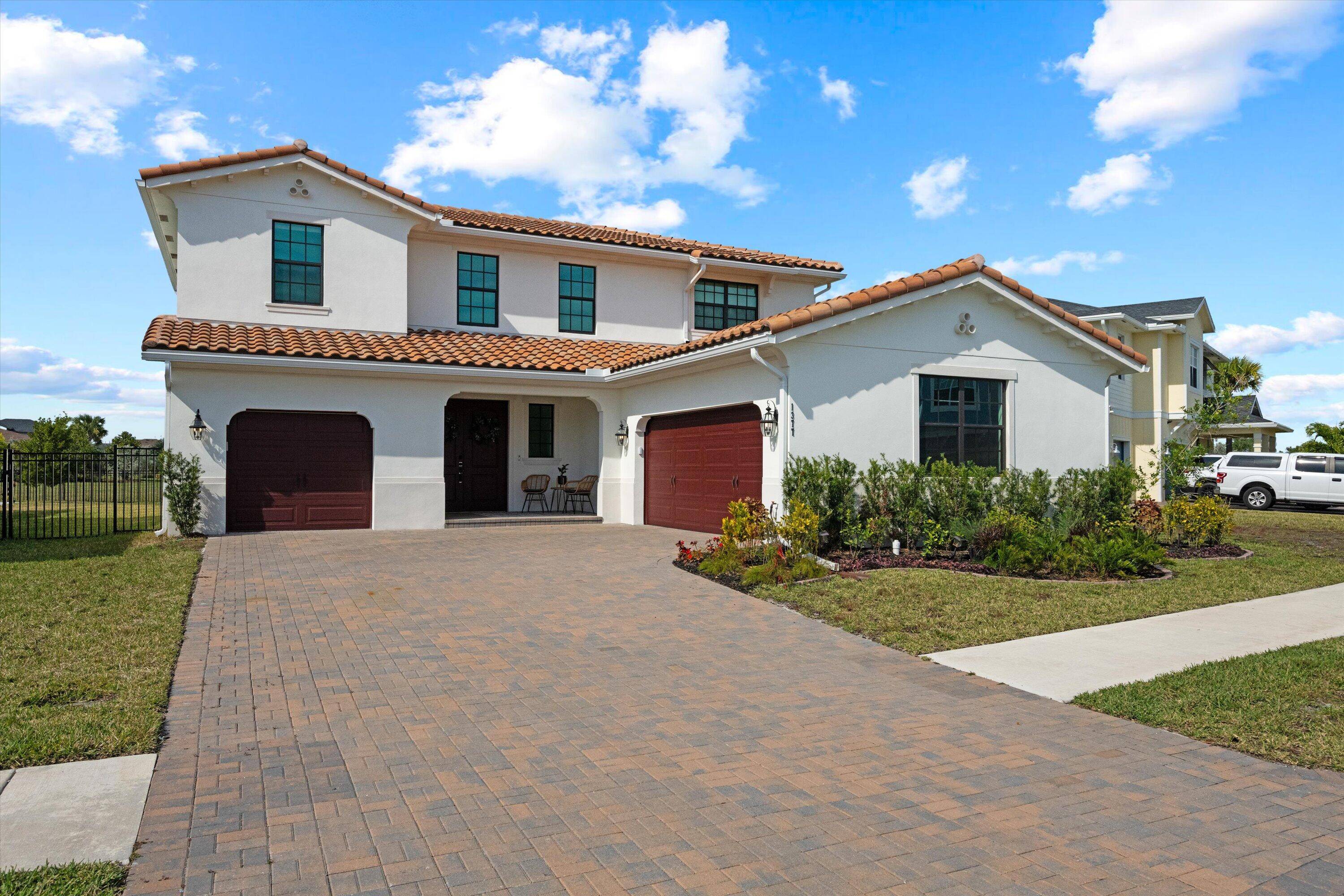 Welcome to this stunning 4 bed, 3 bath Spanish style home, featuring a highly sought after floor plan, set on an expansive lot.