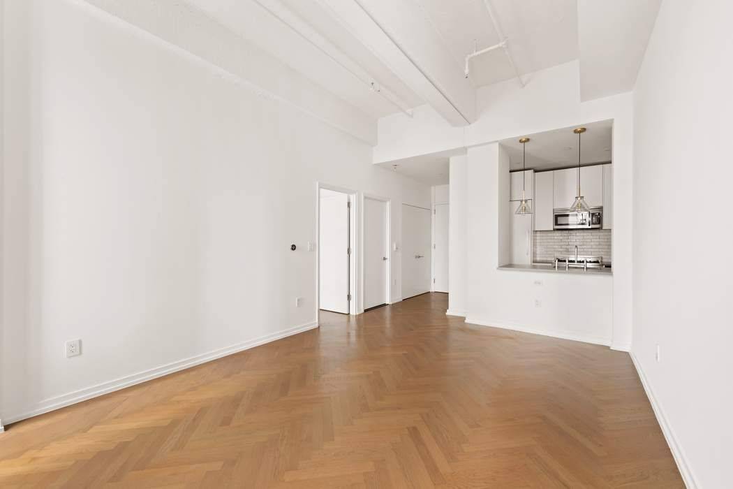 Live the Williamsburg waterfront lifestyle at Austin Nichols House, an iconic loft style condo at 184 Kent Avenue.