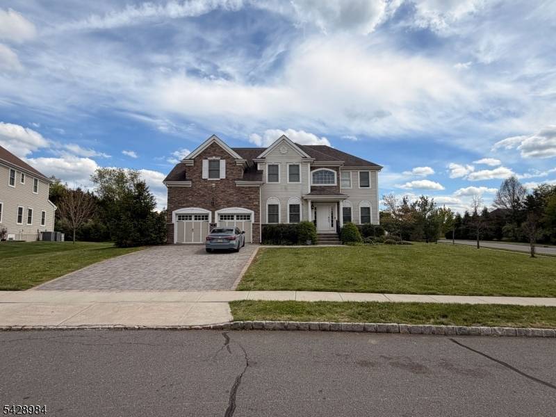 Impeccable 6 bedroom, 6. 5 bathroom Colonial on a corner lot in the sought after East Country Estates community of Skillman.