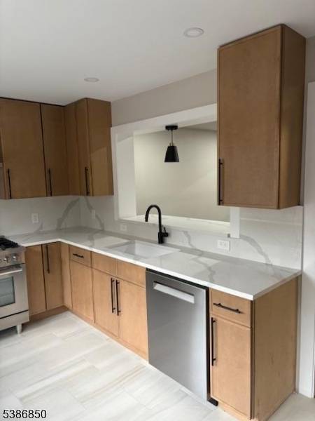 Step into this beautifully updated Cranford townhome that feels brand new from top to bottom !