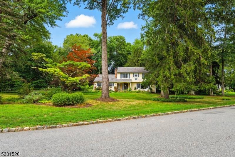 Welcome to 10 Birchwood Lane, a spacious Colonial nestled on a picturesque corner lot in one of Boonton Township's most sought after neighborhoods.