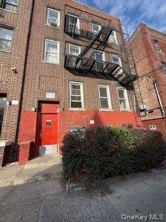 Brick 3 story building offers 6 Apartment Finished Basement Investment Opportunity in the heart of Wakefield !