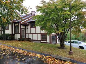 Serene, sun filled end unit condo located in the highly desirable Oronoque Forest condominium complex.