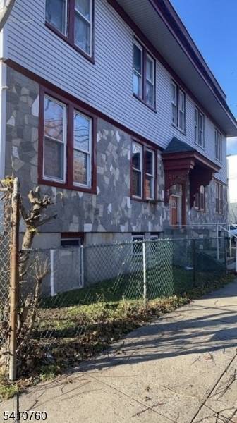 Spacious 4 family corner property located opposite West Side Park in the desirable 07103 section of Newark.