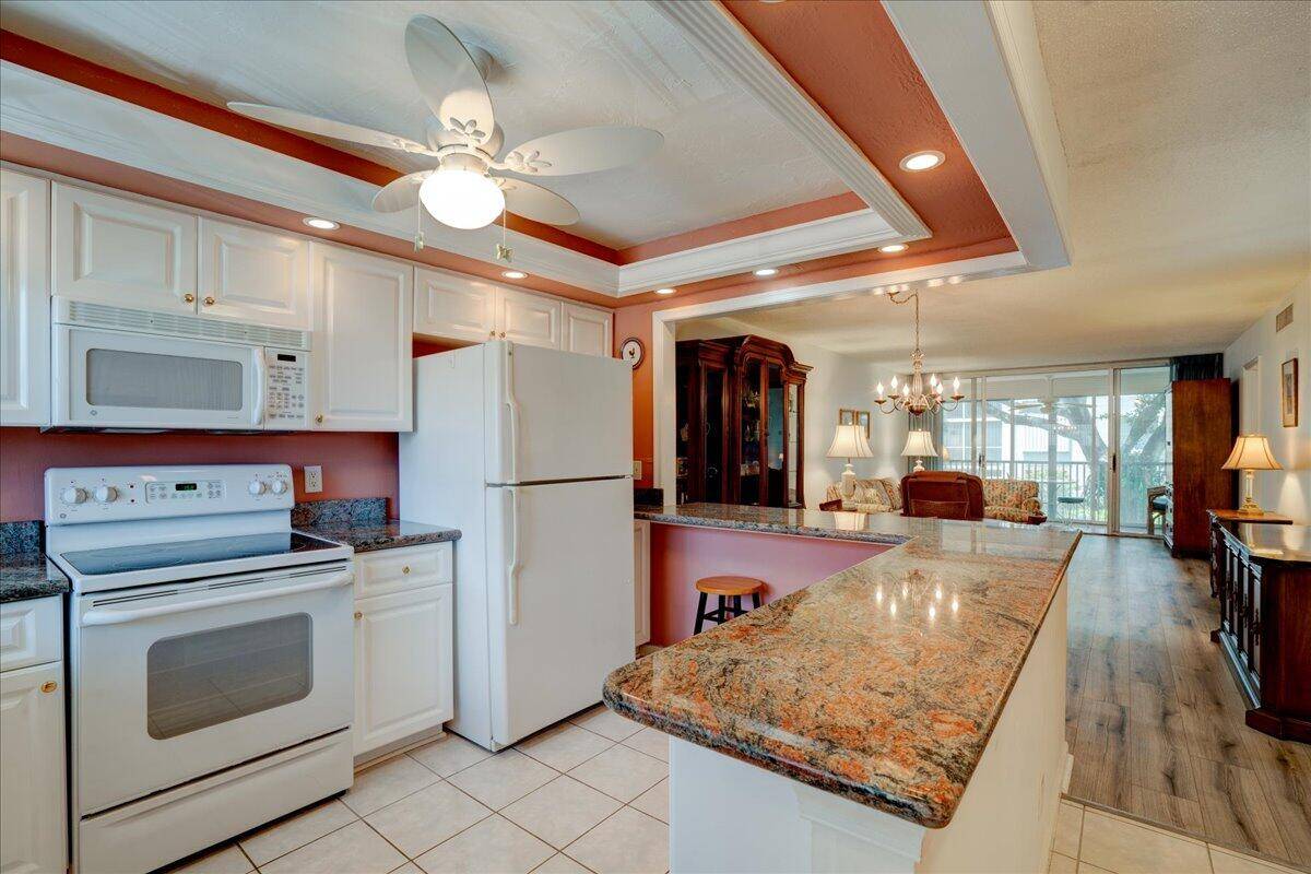 Furnished and move in ready, this condo will be your full time Florida residence or warm winter getaway.