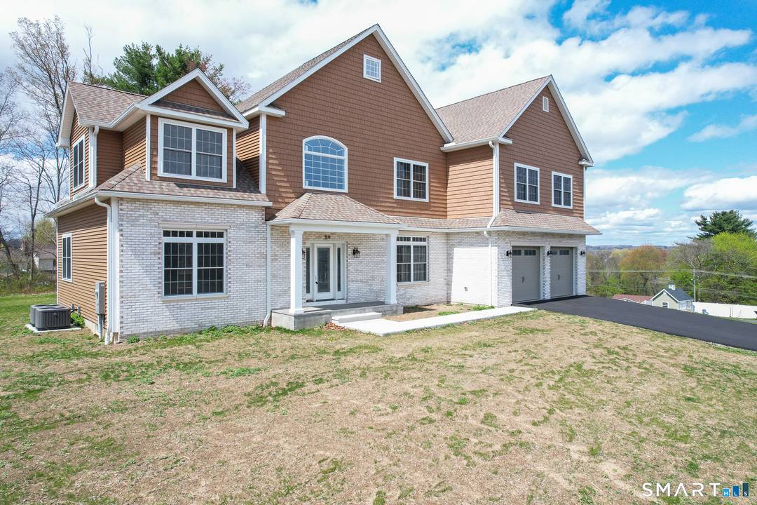 Coming Soon Welcome to 59 J Ryan Way in Watertown a stunning four bedroom home thoughtfully designed for both everyday living and exceptional entertaining.