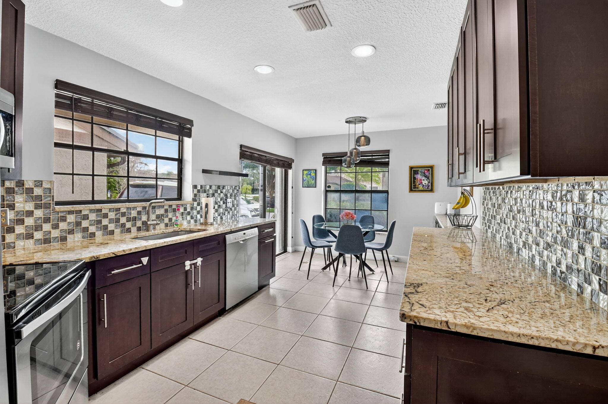 Beautifully Upgraded Townhome in Gated Boca Ridge !
