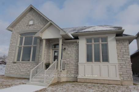 A rare blend of bungalow and two storey design in the prestigious Joshua Creek community.