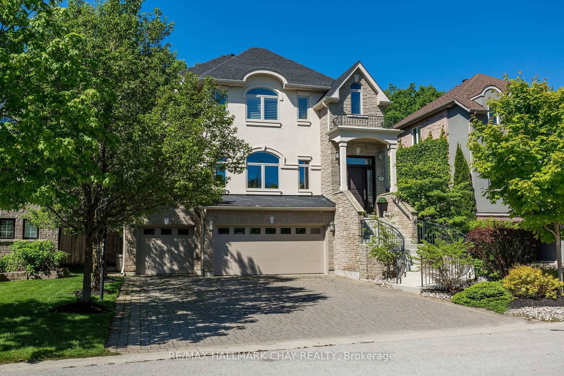 Tucked away on a tranquil cul de sac overlooking a picturesque ravine, this impressive 3, 200 sq.