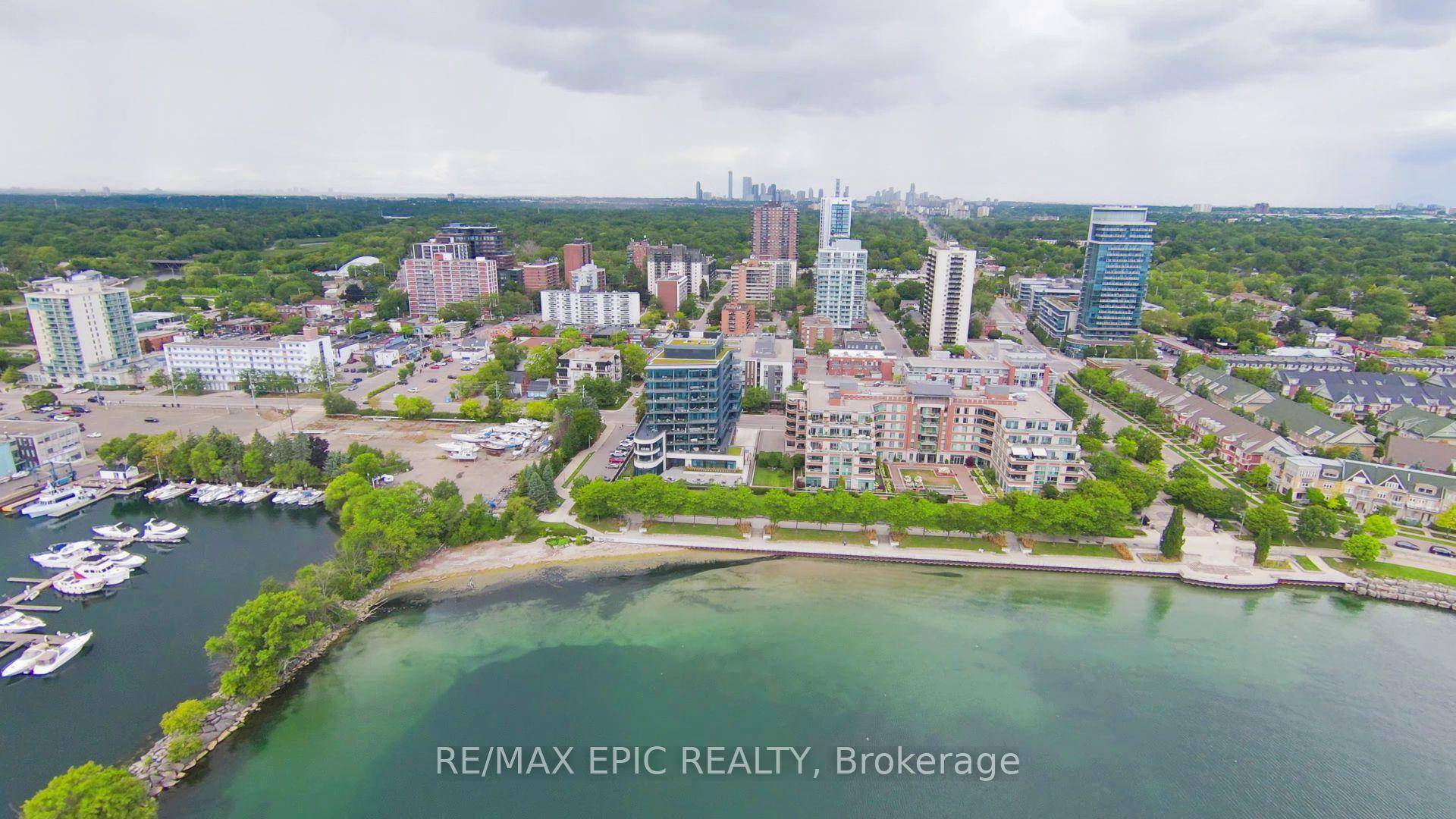 Spacious north east facing corner unit in a boutique condo at the heart of Port Credit Village.