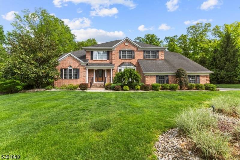 Elegant 5 Bedroom, 5 Bath Center Hall Colonial with 3 Car Garage on Cul de Sac Over an Acre of Private, Level Property Discover timeless elegance and modern comfort in ...