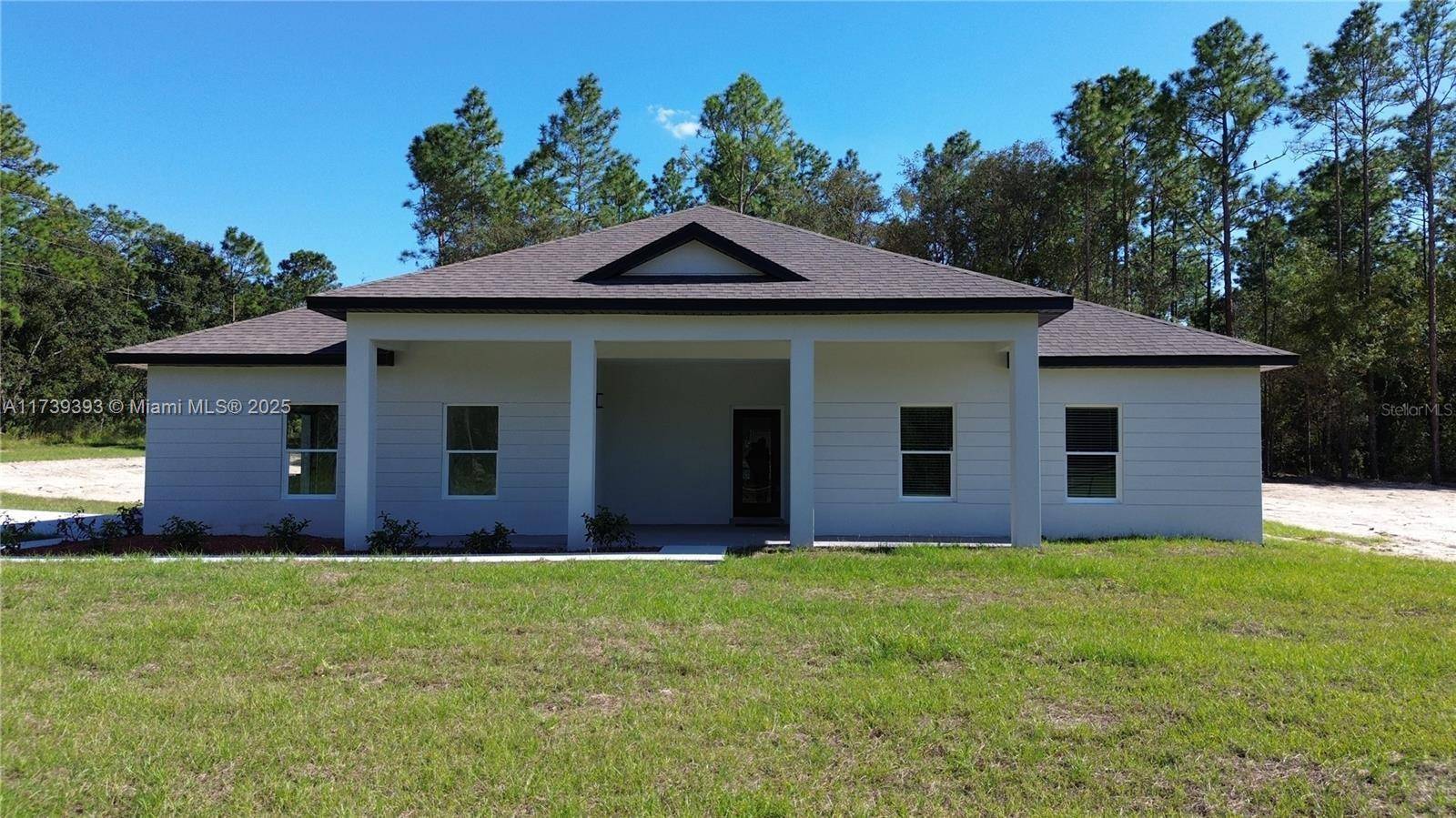NEW PRICE. COMPLETED BEAUTIFUL BRAND NEW 4 2 HUGE 1 ACRE CORNER LOT RURAL HOME, DOUBLE CAR SIDED GARAGE WITH 6 CARS LONG DRIVEWAY, COVERED FRONT PORCH AND REAR LANAI.