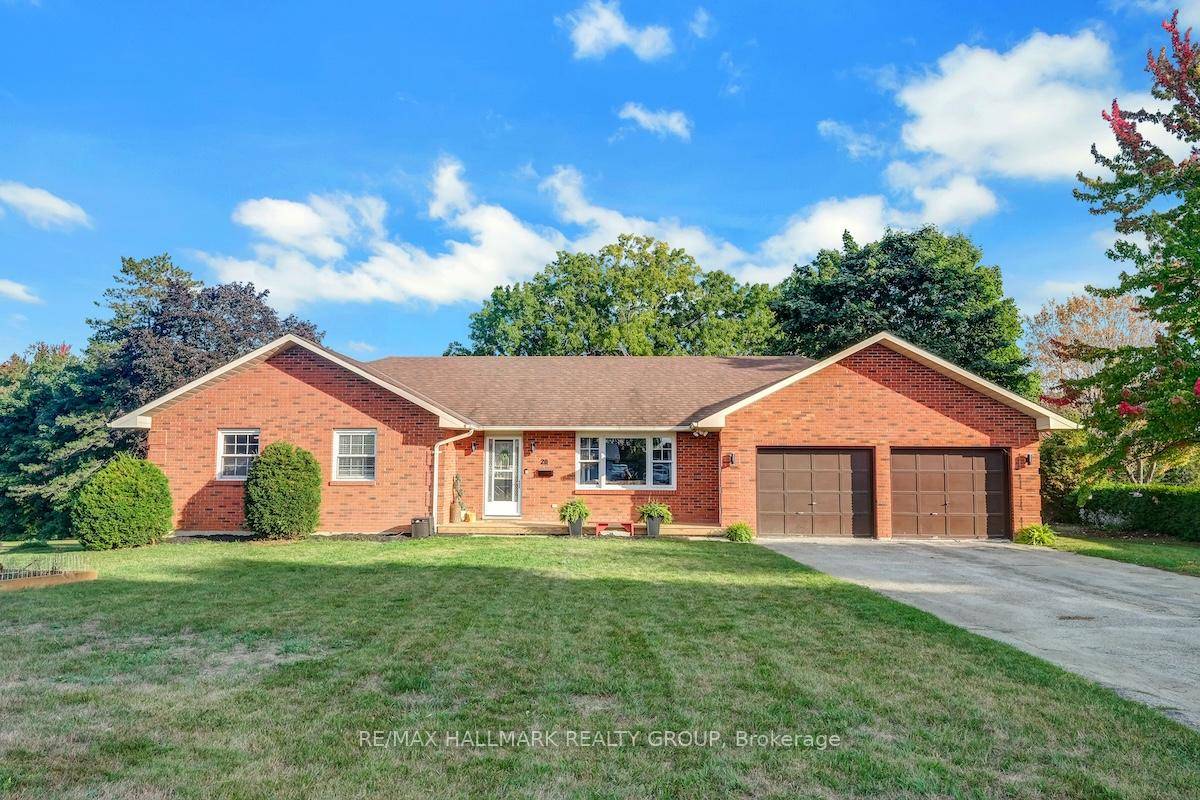 This amazing all brick bungalow with attached double garage, sits proudly on an irregular lot at the end of a quiet court in the heart of ever expanding Kemptville.
