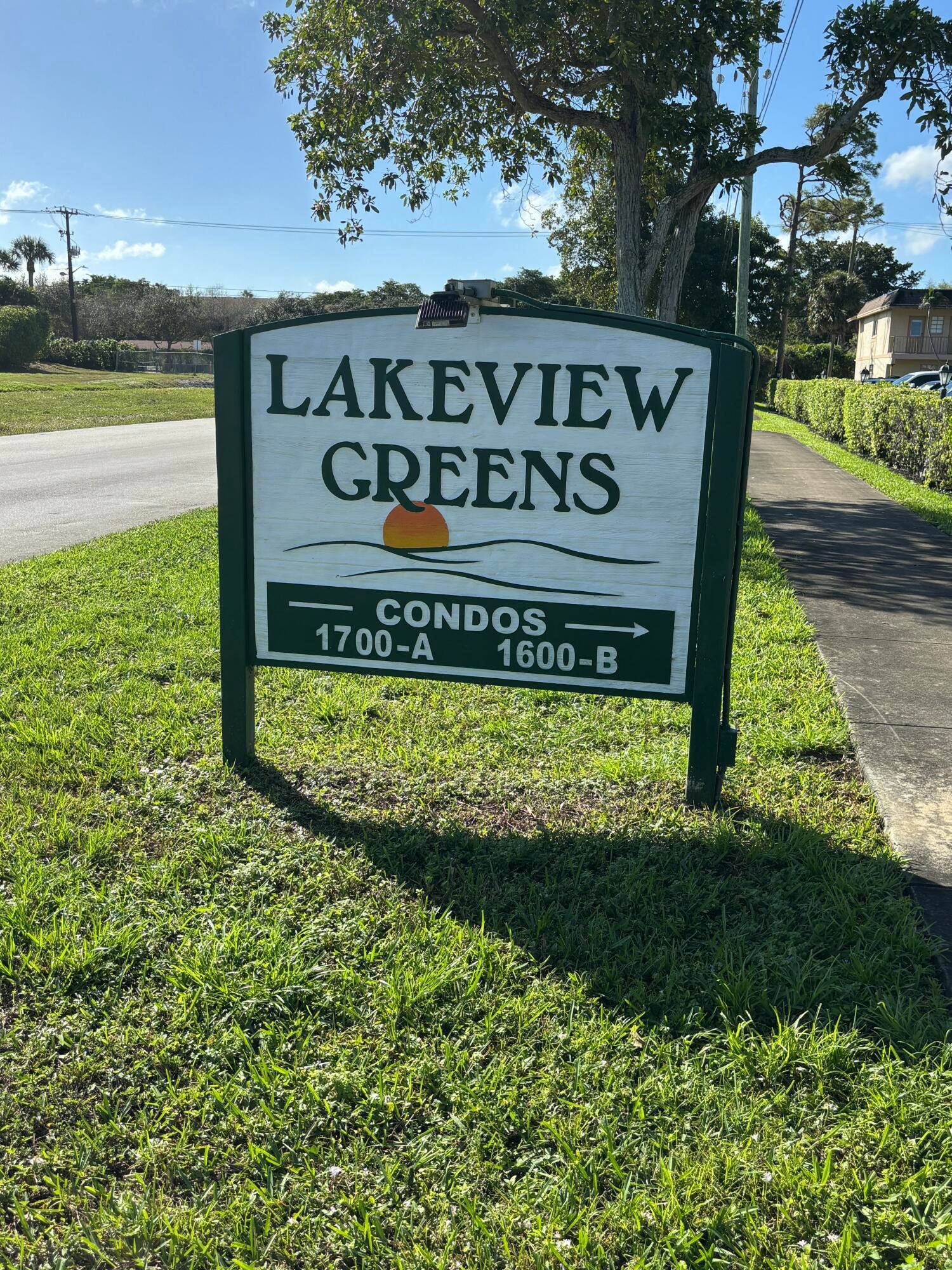 Clean unit with nice floors, white kitchen, new master shower.