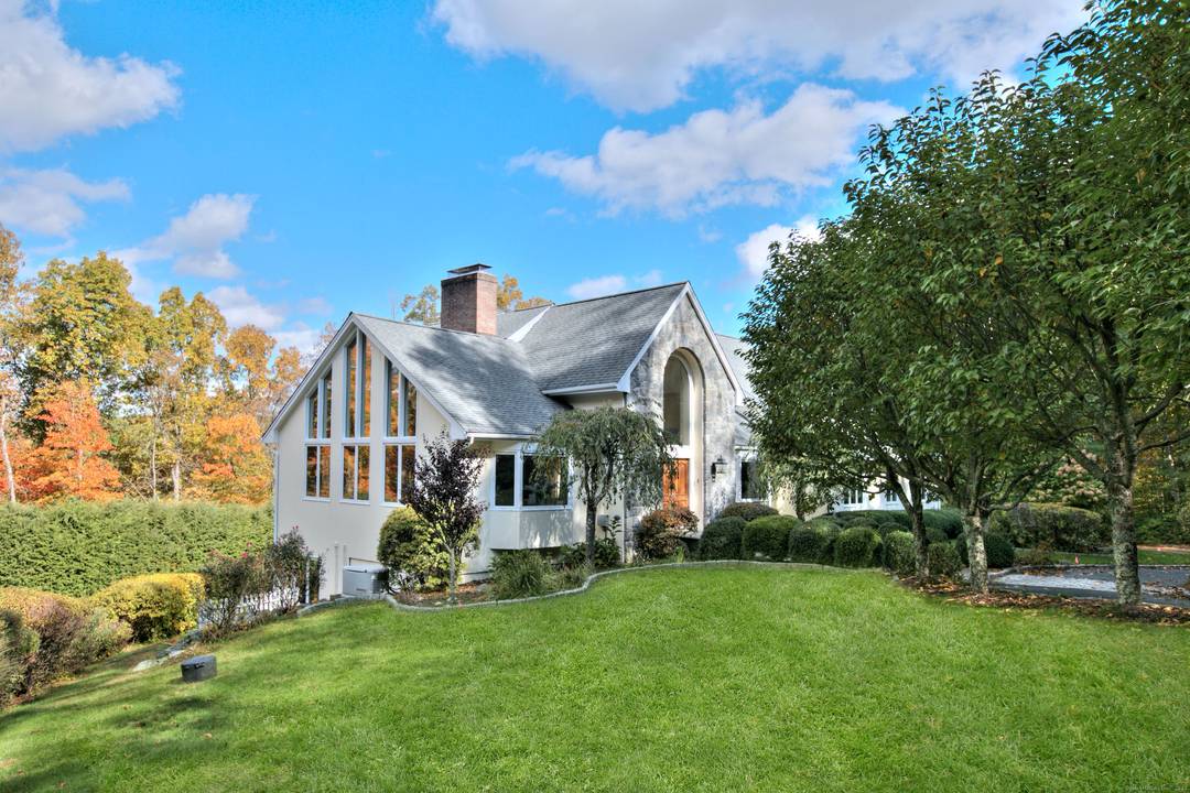 Experience dramatic, modern living in this grand home with a glorious gunite pool exceptional architectural appeal.