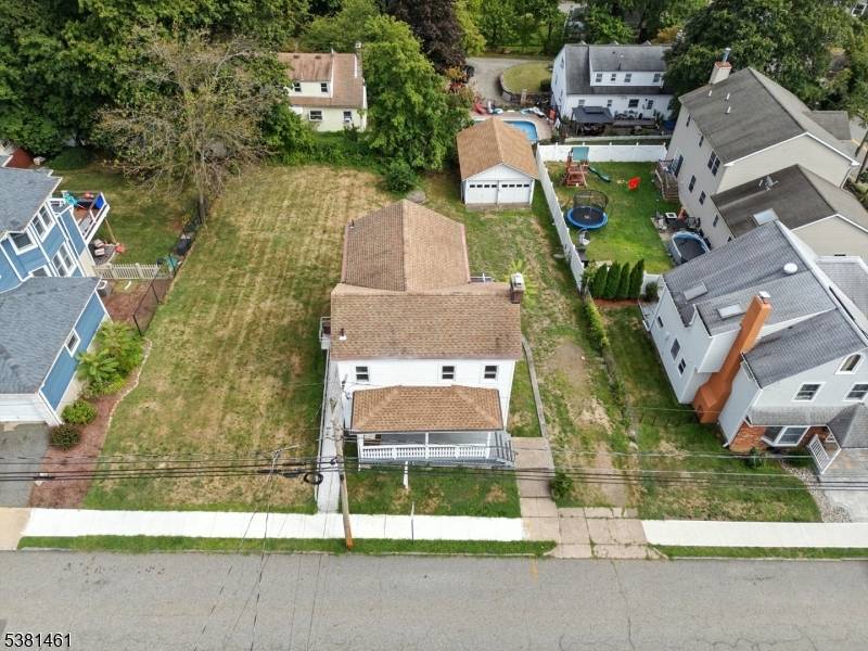 Calling all investors contractors check out this classic Boonton Colonial situated on a gorgeous lot.