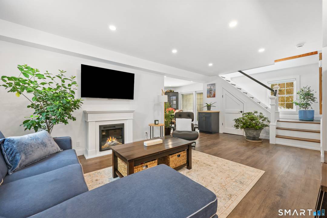 Charming two bedroom carriage house filled with natural light, set on two private acres.