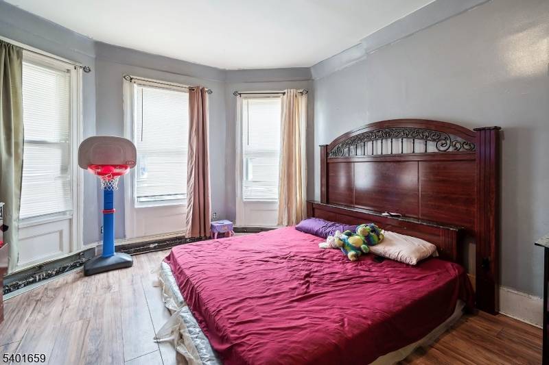 Discover a rare investment opportunity in this beautifully maintained home, perfectly located near downtown Newark, major highways, and the airport.