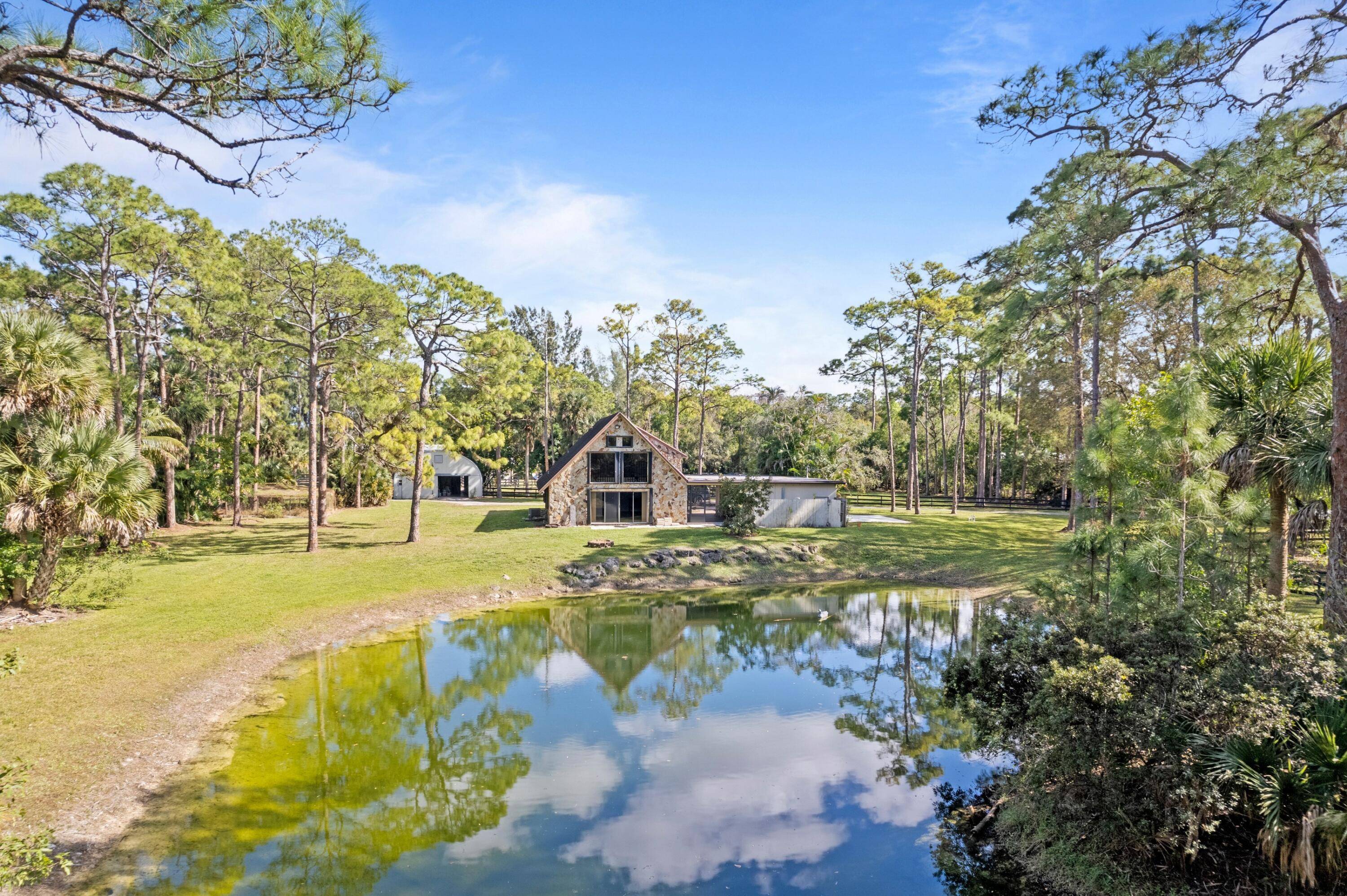 A wonderful opportunity to have horses near everything in highly sought after equestrian neighborhood !