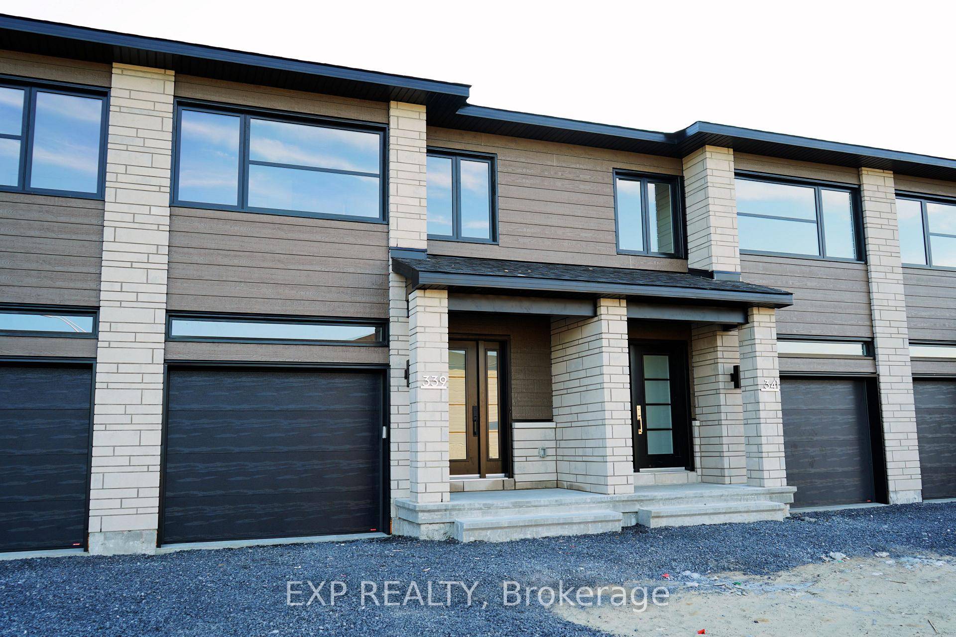 Welcome to White Rock middle unit, a gorgeous townhome on a premium lot featuring a bright open concept layout with a chef's kitchen including an island and walk in pantry.