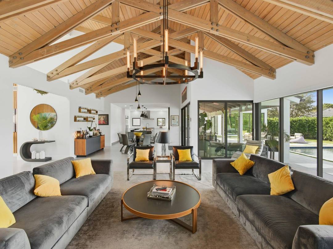 Ideally located near the guard gate, this fully remodeled 4 bedroom, 4 bath home offers modern, minimalistic living at its finest.