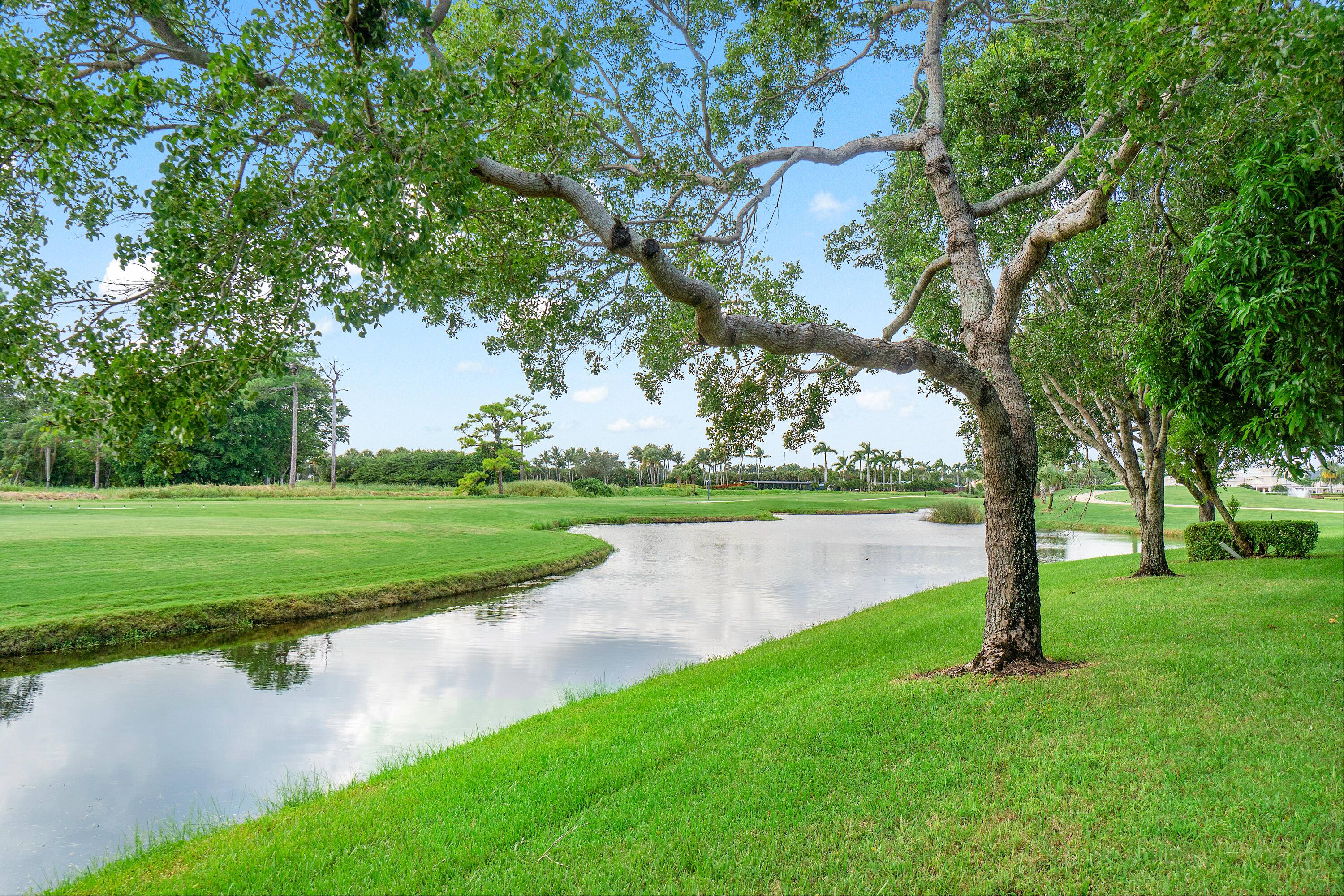 Experience luxury living in this exquisitely brand new renovated condo, ideally situated on the 10th hole of the prestigious Club Course in The Polo Club.