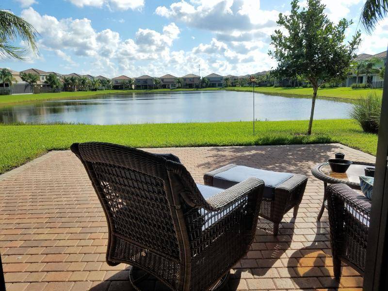 Beautiful Lakefront home with 4 Bedrooms, 3 Bathrooms plus large Loft, open kitchen with double islands, 2 Car Garage and Extend patio over looking long lake.
