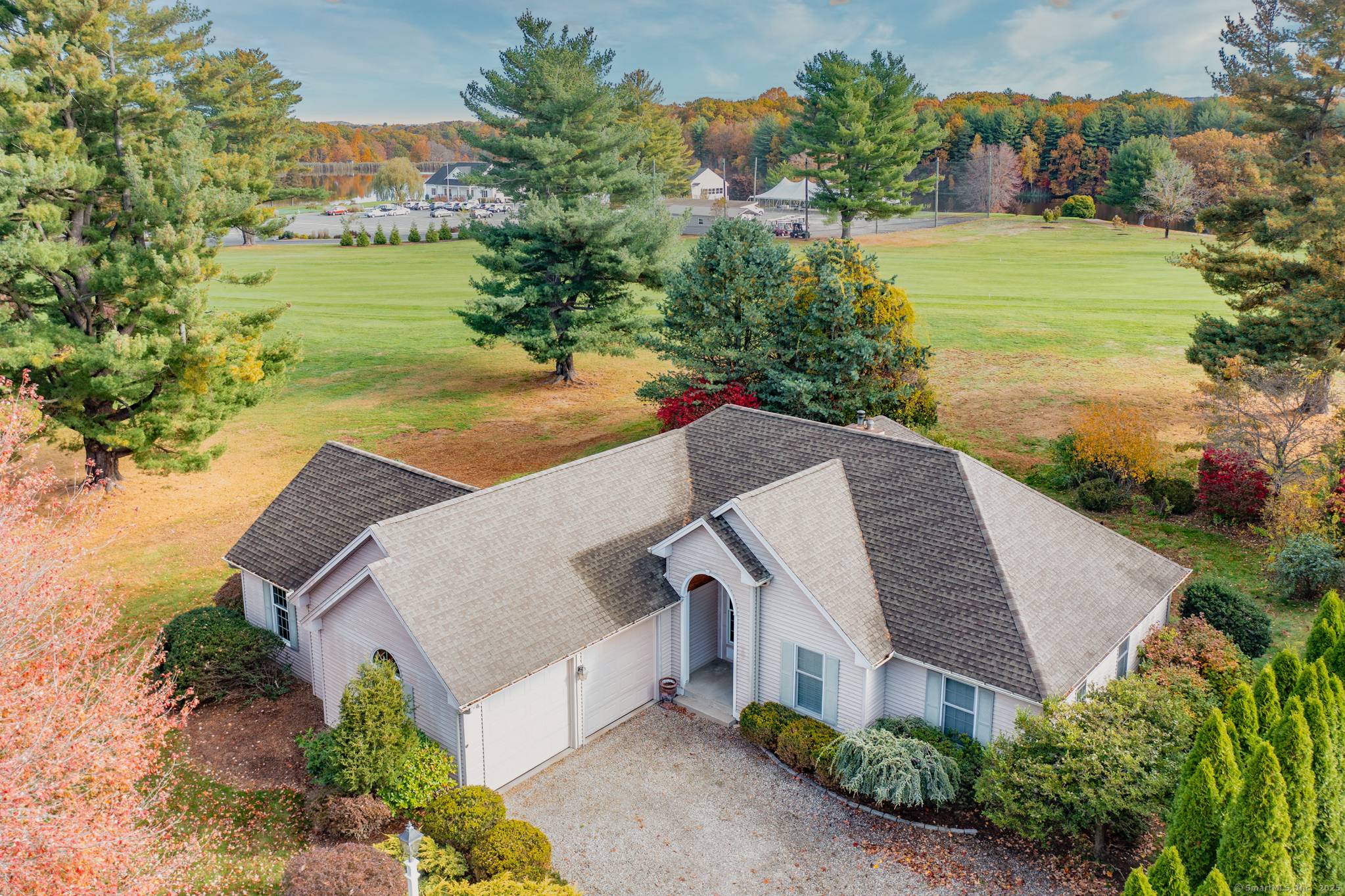 Beautiful home on the 2nd hole of Manchester Country Club.