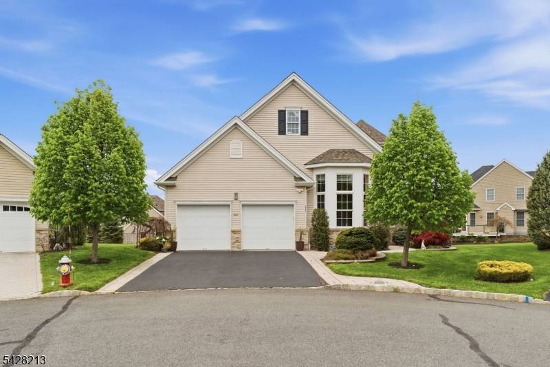 Welcome to this beautifully maintained Rome model residence located in a private cul de sac within the highly sought after gated 55 community of Canal Walk.