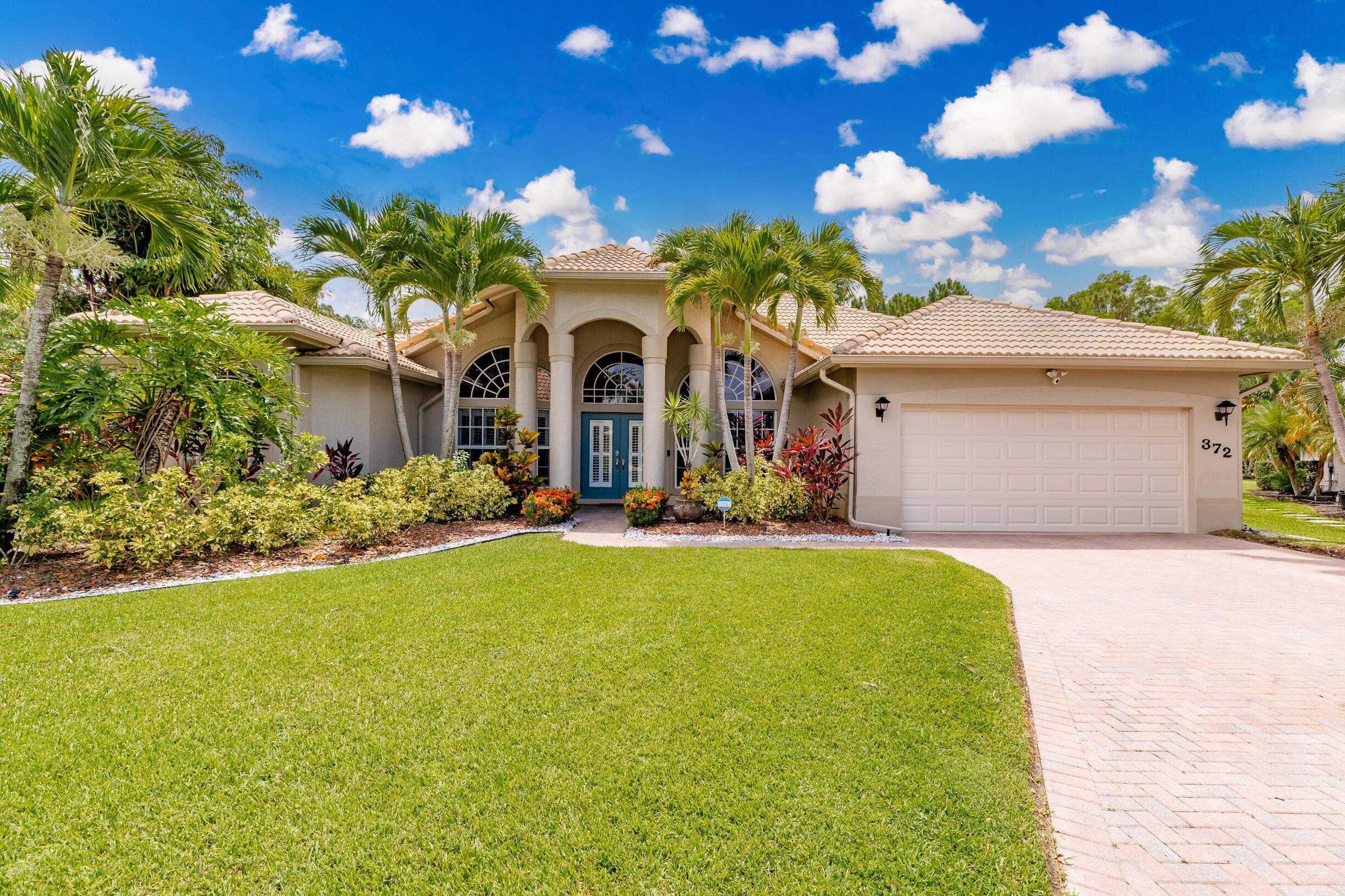 Welcome to 372 SW Egret Landing a beautifully renovated 4 bedroom, 2 bath home in the quiet, desirable gated community of The Sanctuary at Sawgrass Lakes with low HOA Fees.