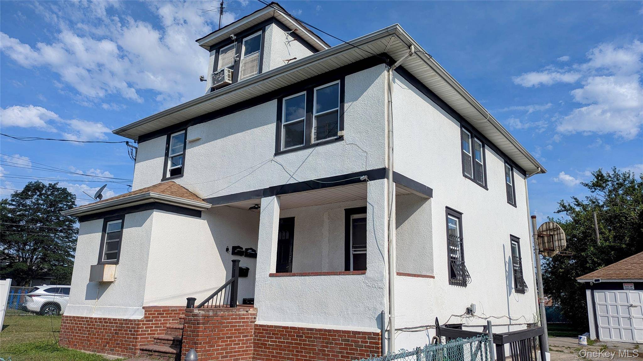 Welcome to this charming and spacious home located at 210 Pearl St, Lawrence, Unit 1.