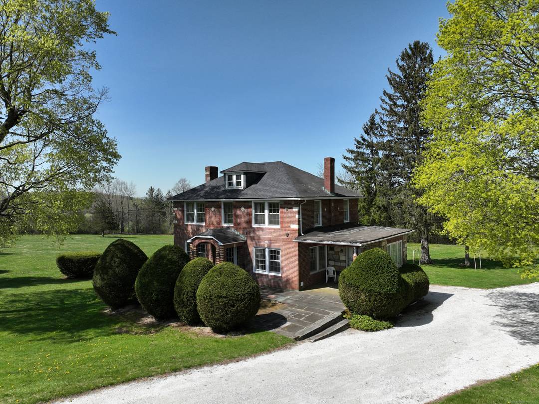Discover Timeless Elegance and Potential at 400 Gay Street, Sharon CT Situated on the edge of over 20 acres of picturesque land, this 1940 hand built brick house awaits a ...
