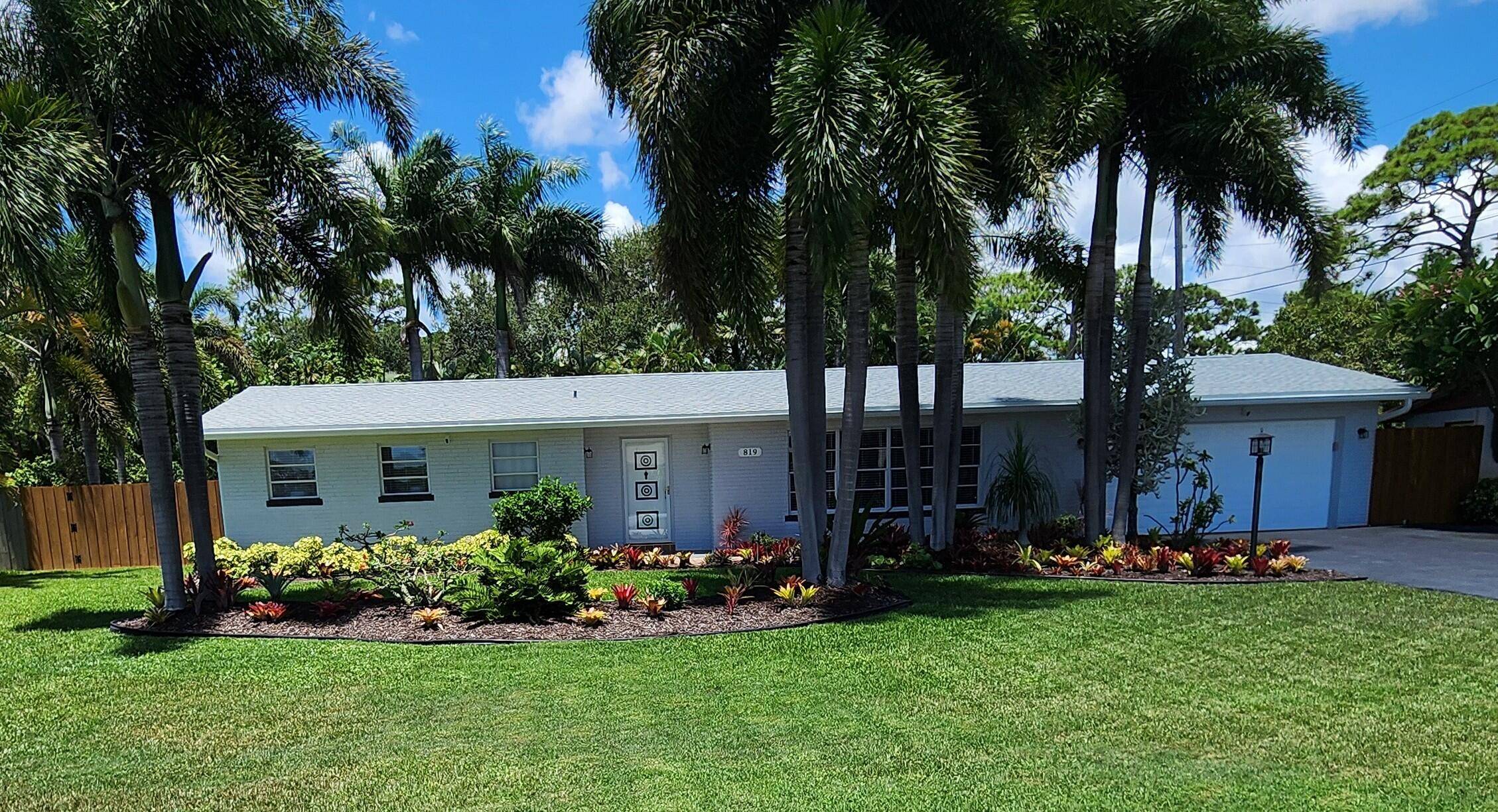 This beautifully maintained Ranch style residence is freshly painted, move in ready and waiting for you.