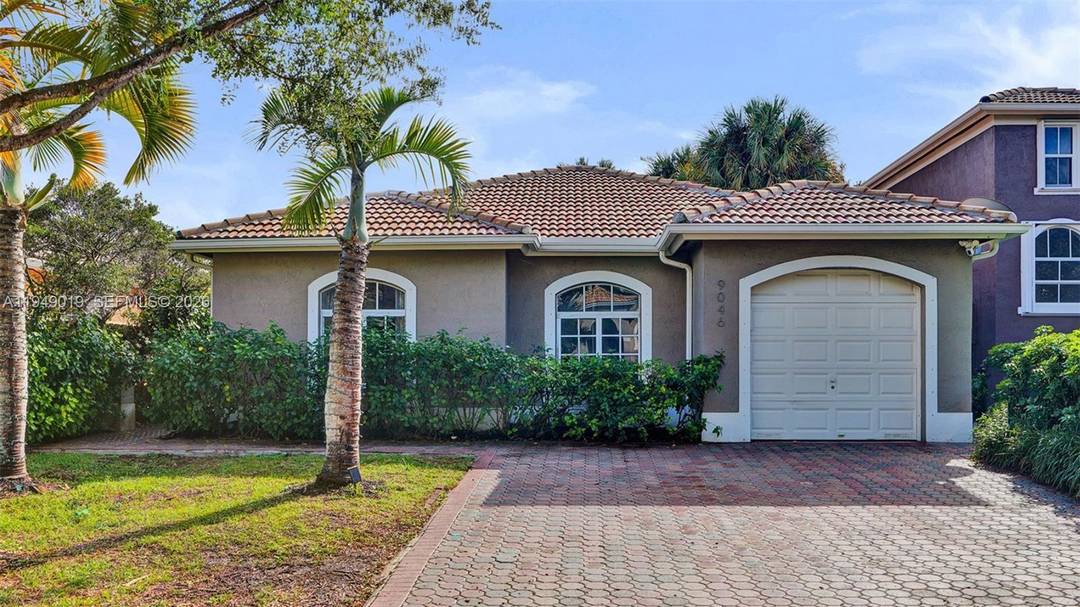 Beautifully updated 3 bedroom, 2 bath home in Palmetto Bay featuring a split floor plan, open living and dining areas, and light oak style flooring throughout.